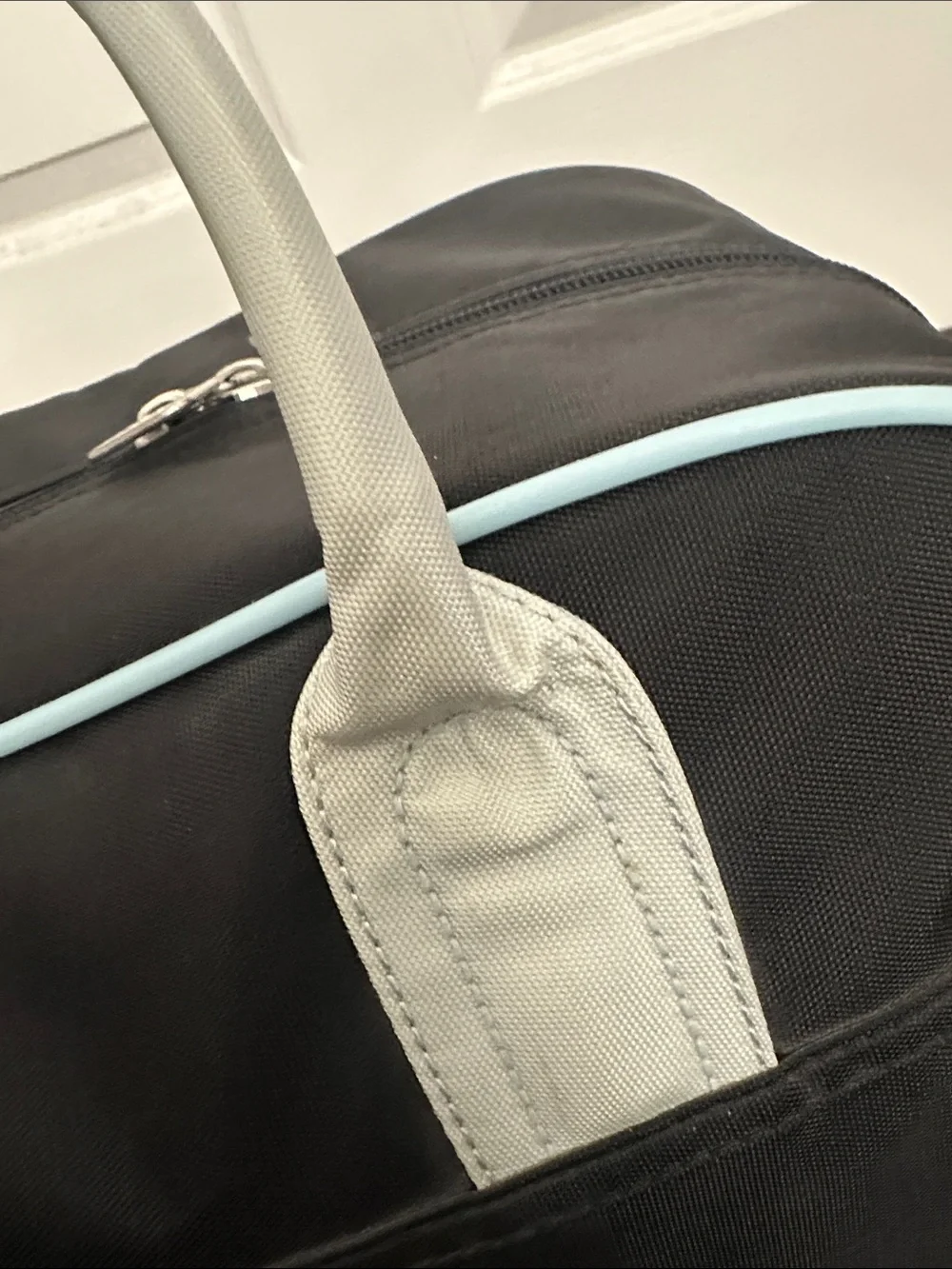 Vintage Puma black duffel bag with light blue trim